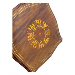 Edwardian inlaid mahogany revolving bookcase, shaped square moulded top with central motif and satinwood band, two tiers with pierced vertical splats, on swivel action base with ceramic castors