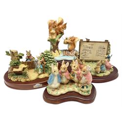 Four Border Fine Arts Beatrix Potter figures, comprising Tableau created to commemorate the Millenium together with a Border Fine Arts Limited Edition no 669814, The Tale of Peter Rabbit Tablet A1306, Four Little Rabbits A2442 and Sailing Home A2443