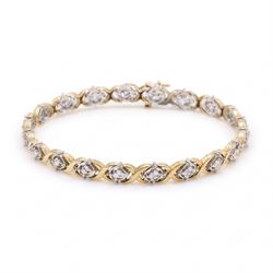 14ct white and yellow gold diamond fancy link bracelet, set with thirty-eight round brilli...
