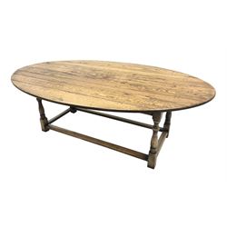17th century style oval distressed light oak plank top dining table, rectangular stretcher base, L228cm, W150cm, H77cm