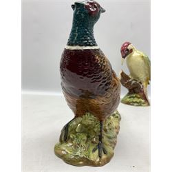 Three Beswick figures of birds, comprising pheasant no 1225, magpie no 2305 and woodpecker 1218, all with impressed marks beneath, tallest H22cm