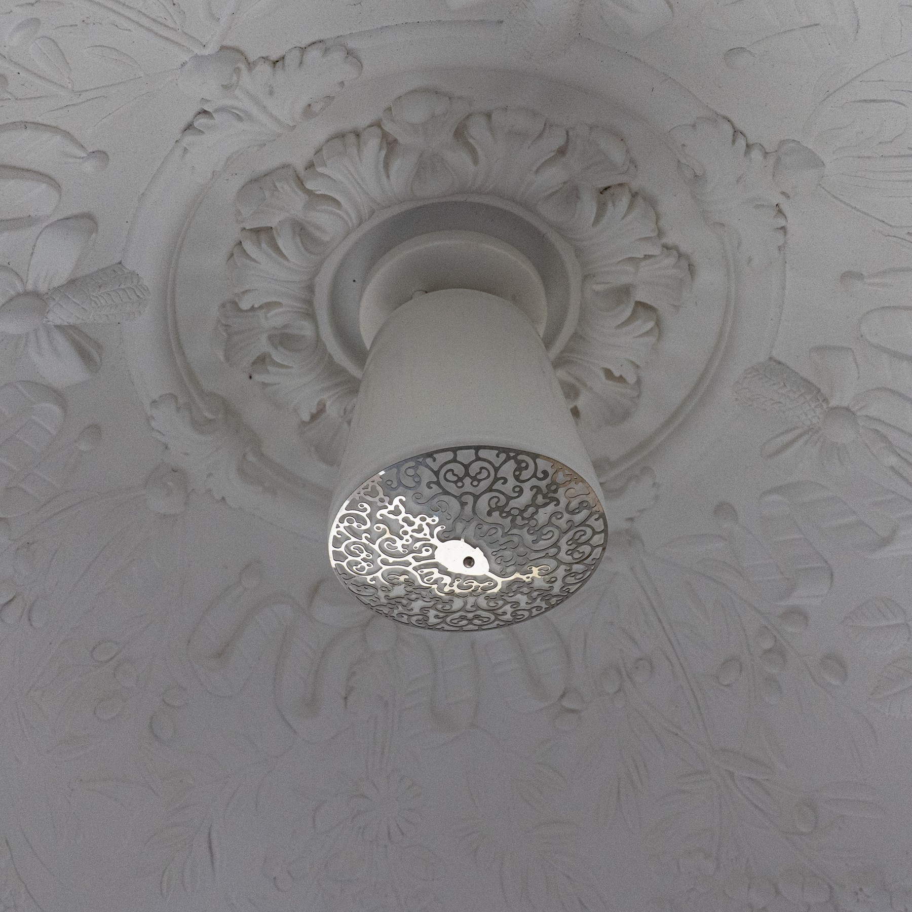 Marcel Wanders for Flos - pair of 'Skygarden S2' suspension lights, the monumental gilt domed shades concealing richly modelled white plaster interiors of Baroque-inspired floral and foliate ornament, with a large moulded central ceiling rose comprised of acanthi and extending ribbon festoons