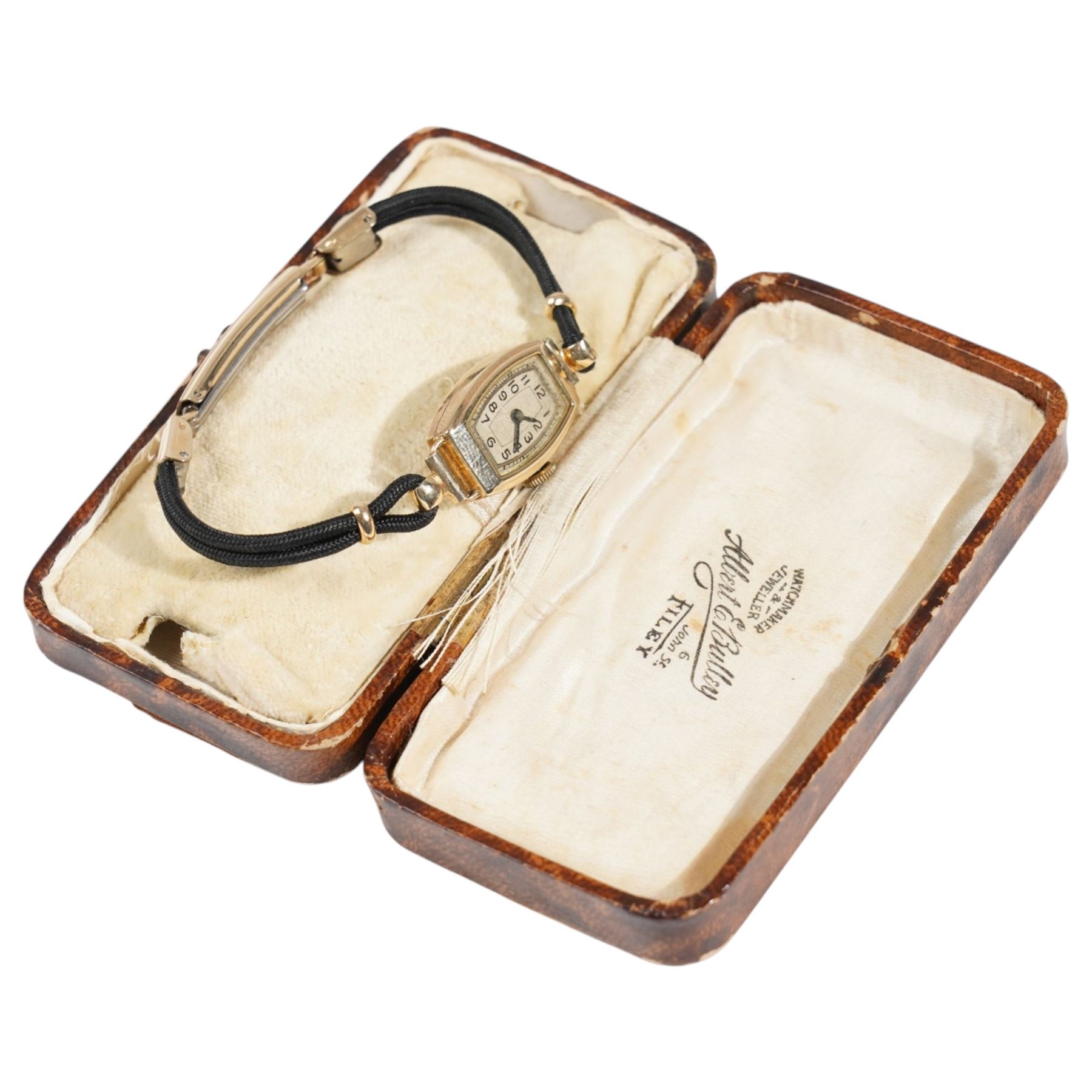 Ladies 9ct gold wristwatch on black rope and rolled gold strap