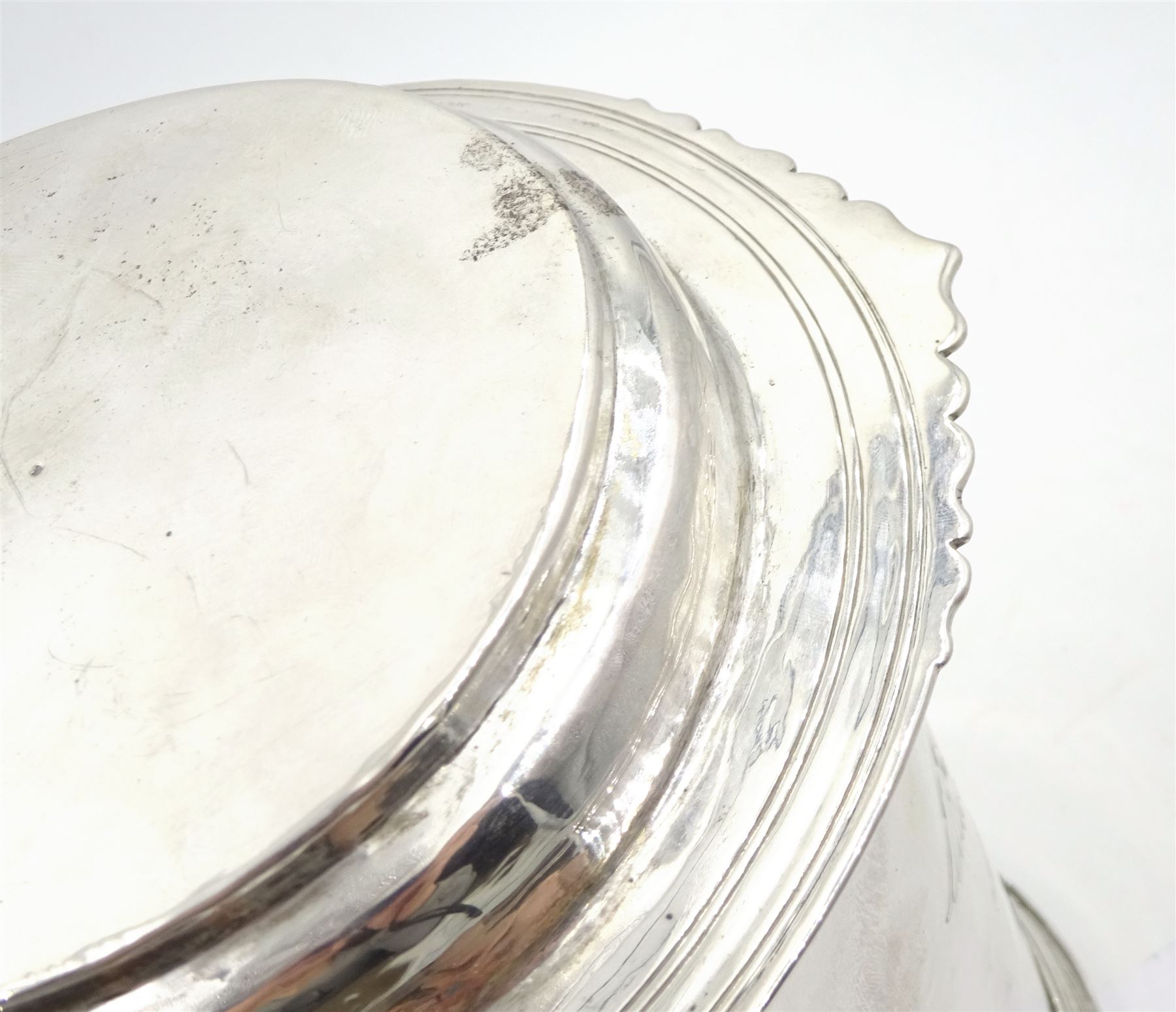 Queen Anne silver tankard, of plain tapering cylindrical form, with stepped and flat-domed cover, twit cast thumbpiece and curved handle, the body engraved with eagle crest, hallmarked Abraham Barachin, Hull, circa 1706, the body and cover stamped once with makers mark and twice with town mark, H18cm, approximate weight 21.46 ozt (667.7 grams)
