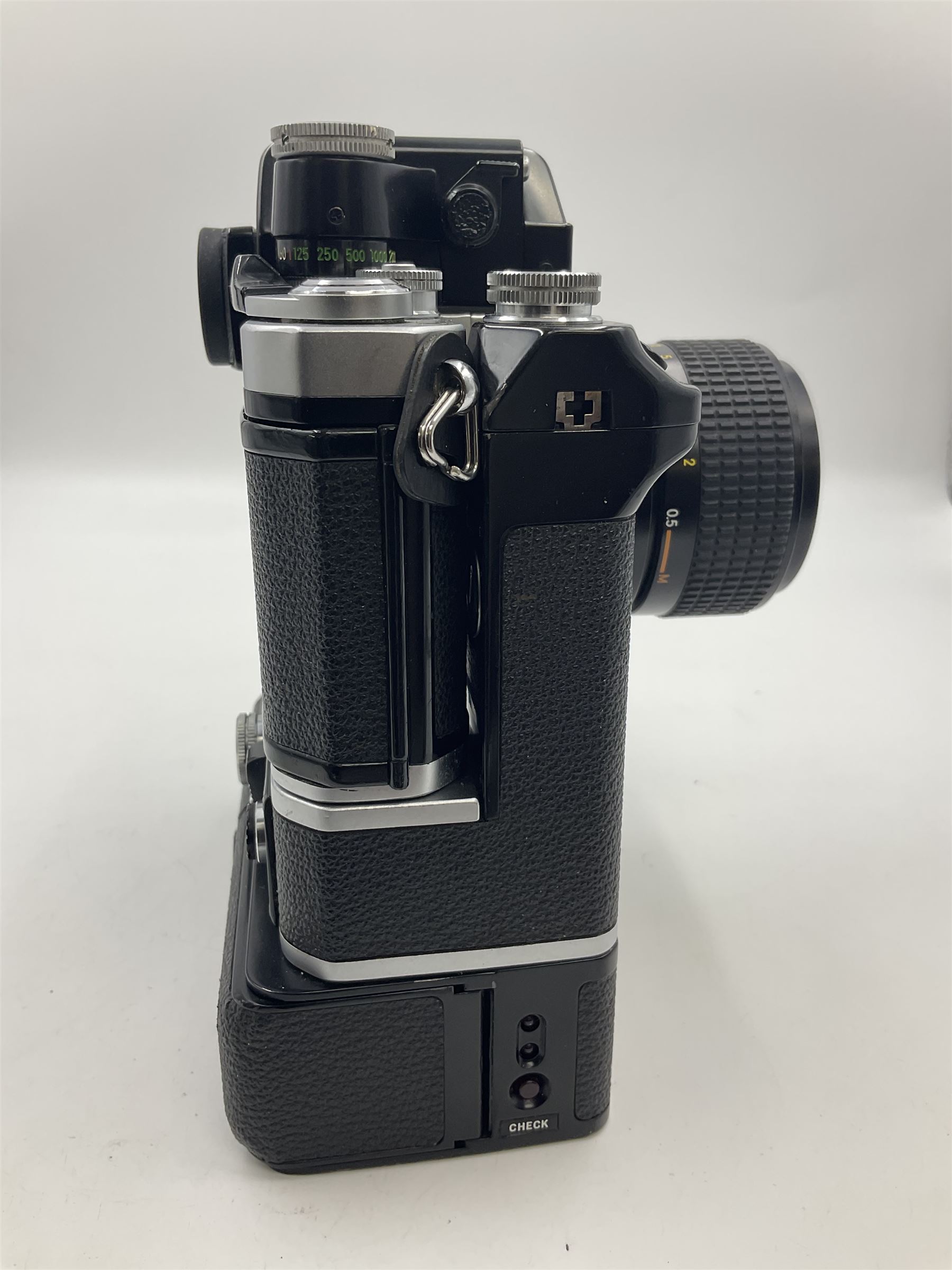 Nikon F2A Photomic camera body, serial no. 7844439, with 'Nikon Zoom-NIKKOR 35-70mm 1:3.5-4.8' lens, serial no. 5352031, Nikon MD1 Motor Drive, serial no. 208608 and Nikon MB1 battery pack