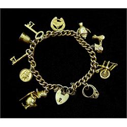 9ct gold curb chain bracelet with heart locket and ten 9ct gold charms including Donald Duck, spinning wheel, key, scooter and thimble, hallmarked or tested, approx 33.9gm