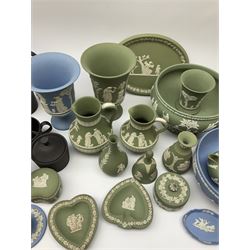 Collection of Wedgewood light blue and sage green Jasperware, to include blue bowl, D20cm, green footed bowl, D20cm, two large vases, trinket boxes, jugs, plates, etc., (29), together with a Wedgewood Black basalt coffee set, comprising coffee pot, milk jug, lidded sugar bowl and six coffee cans and saucers. 