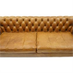 Contemporary Chesterfield design 'Caesar' three seat sofa, traditional shape with out-swept arms, upholstered in tan leather with loose seat cushions, the back, sides and buttons upholstered in chevron stitched Harris Tweed, on turned feet