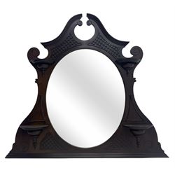 Early 20th century mahogany overmantel mirror, shaped broken pediment crest with open latt...
