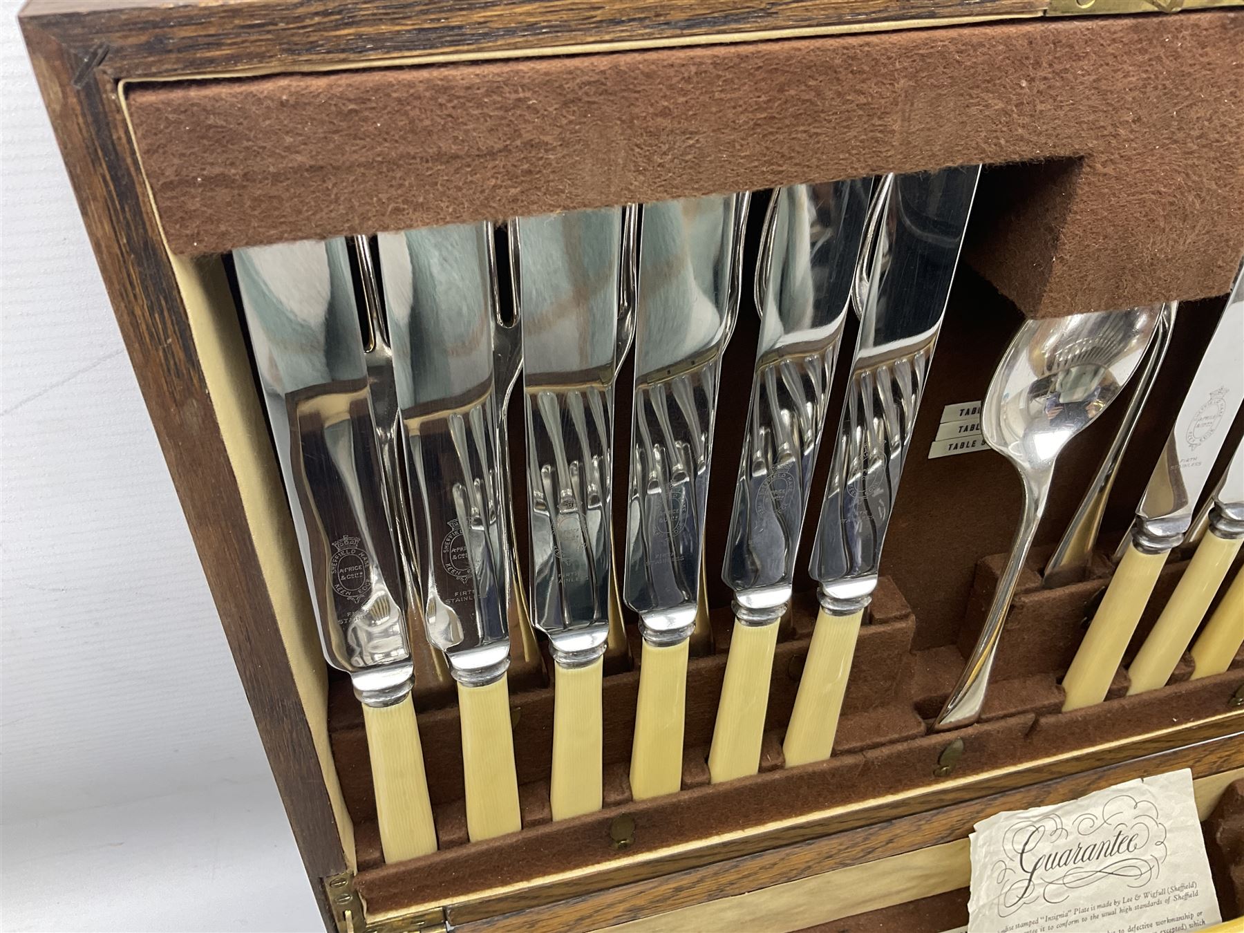 Twelve place setting canteen of cutlery by Lee & Wigfull Ltd, cased in an oak  chest, with key, meat carvers are missing, H18cm, L44cm 