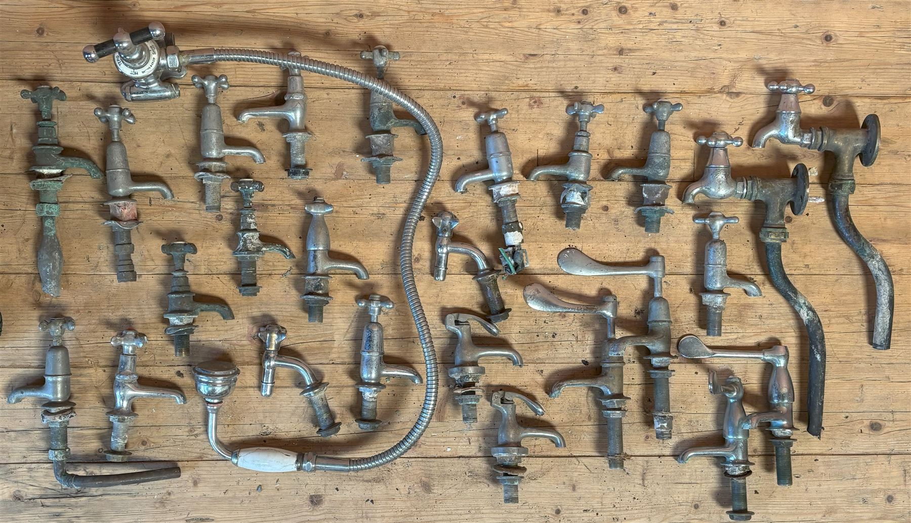 Quantity of chrome plate brass taps, including a Shanks & Co. ceramic mounted shower head and tap.  - COLLECTION BY APPOINTMENT FROM: The White House, Thirsk Road, Easingwold, York, YO61 3NF - CALL 01723 507111 TO ARRANGE