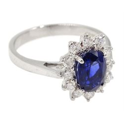18ct white gold oval sapphire and diamond cluster ring, hallmarked, sapphire approx 1.40 carat, total diamond weight approx 0.25 carat