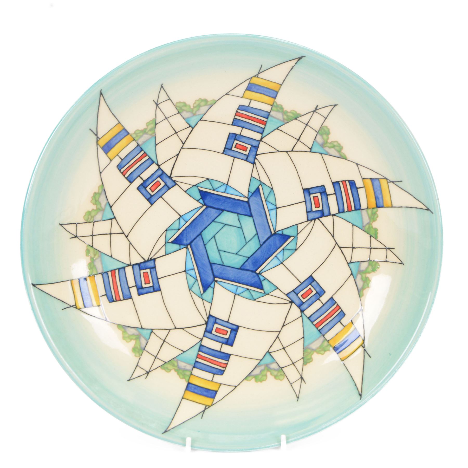 Dennis China Works charger, designed by Sally Tuffin, dated 2016, tube line decorated with  stylised yacht decoration on a blue/green ground, D37cm