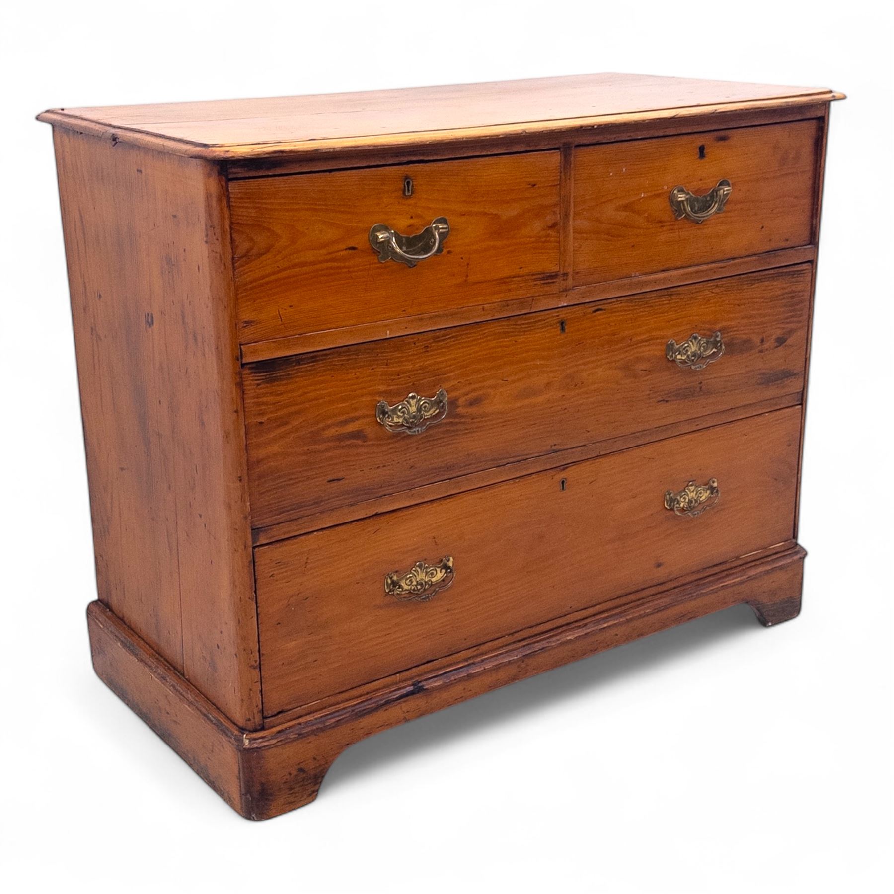 19th century pine chest of drawers, rectangular moulded top over two short and two long drawers fitted with brass handles, raised on bracket feet