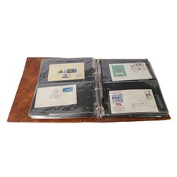 Approximately thirty-seven Great Britain Queen Victoria covers, including penny black with red MX cancel and four margins, two embossed, together with King Edward VII and later covers, in one ring binder folder