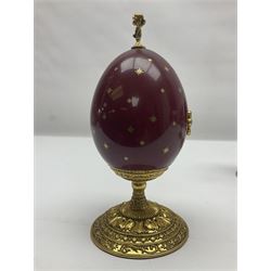 Franklin Mint House of Faberge three collectors eggs, comprising A king is born, We three kings, The flight into Egypt