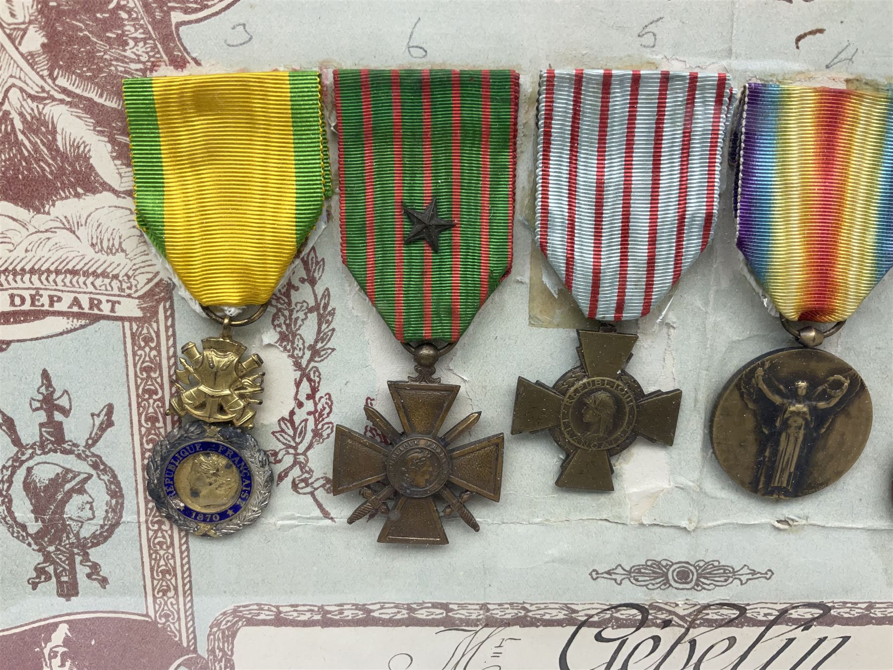 Six WW1 French medals comprising Valor Discipline 1870 3rd Republic Military Medal, Croix De Guerre with star, Croix Du Combattant, Medaille Inter-Alliee De La Victorie, Orient Medal and Medaille Commemorative De La Grande Guerre 1914-18; all with ribbons; mounted, framed and glazed with certificate named to Mr. Gebelin Herve Brigadier au 4th Chassrs. D'Afrique