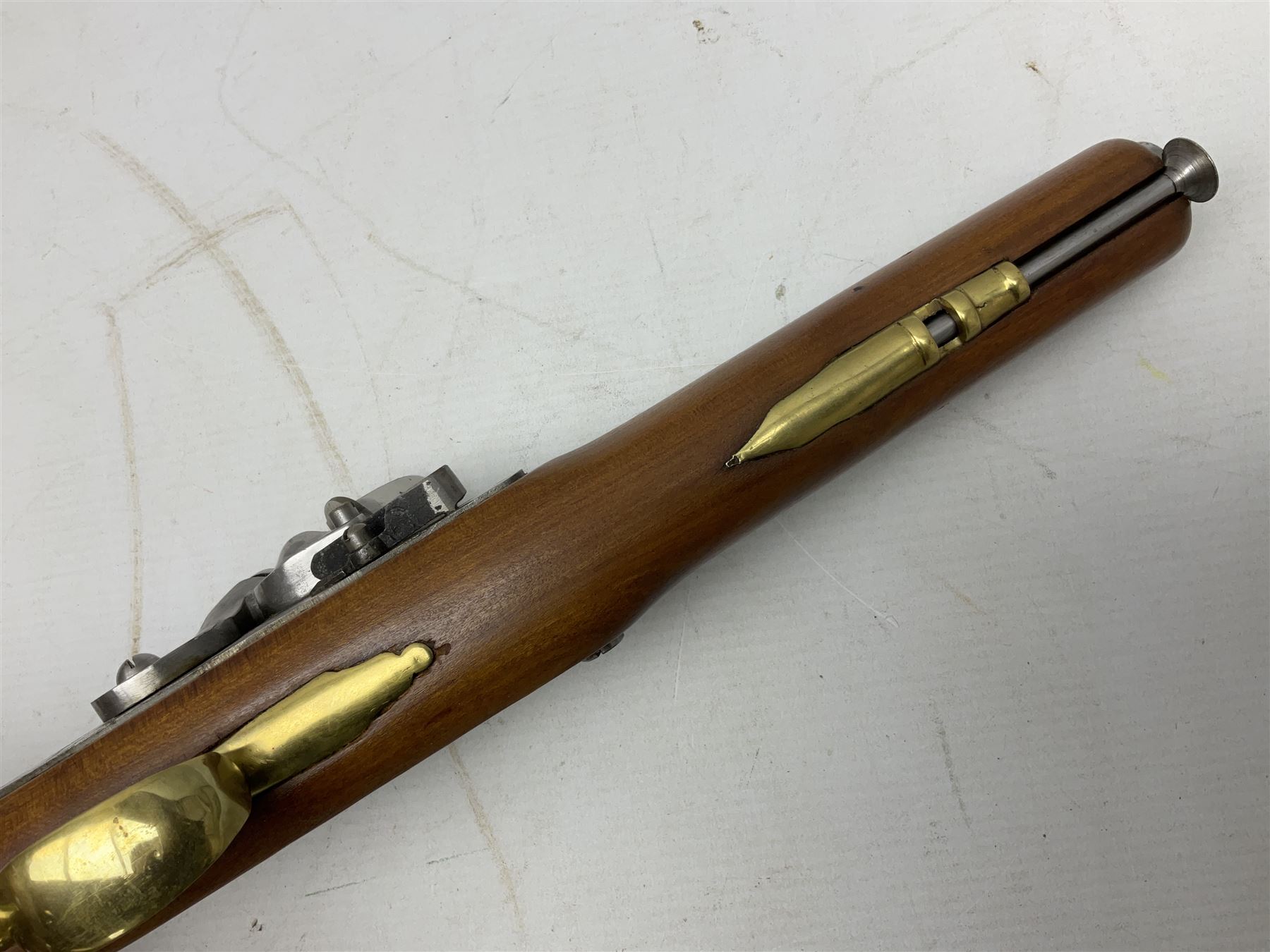 Reproduction non-firing flintlock pistol with brass skull crusher butt, the lock-plate inscribed 'Tower' and 'GR' L40cm; Sabre Japan Original Bowie Knife in sheath; and Indian embossed nickel two-piece walking cane (3)