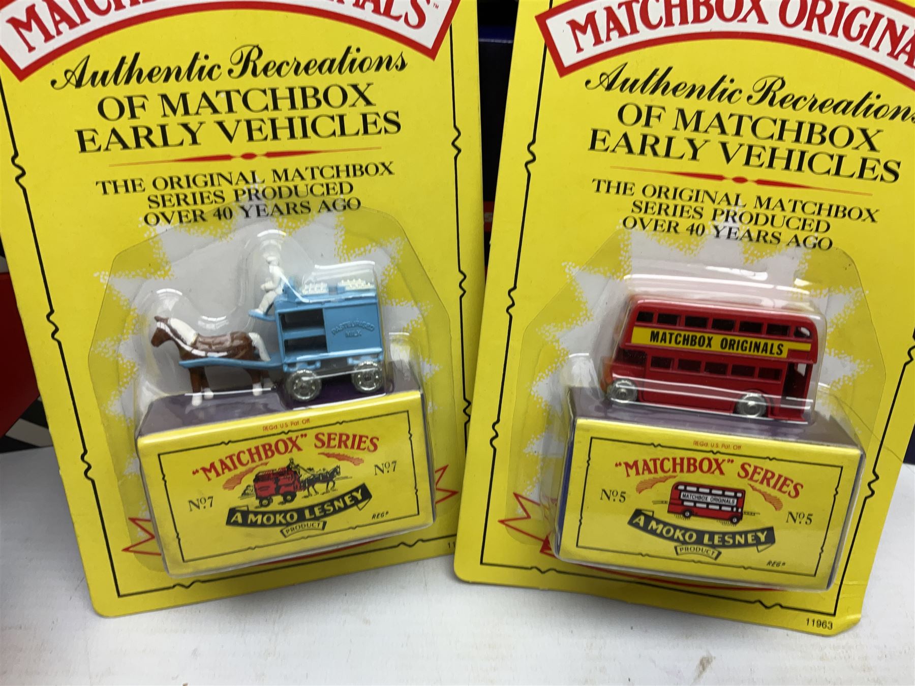 Corgi - thirty-four modern die-cast models including cars, commercial vehicles, racing cars, sports cars, car transporters etc; all boxed; Bburago boxed set of five cars; four Matchbox Originals blister packs etc