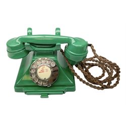 Jade green Bakelite telephone, of pyramid form with alphabet dial, brown braided handset cord and a base draw