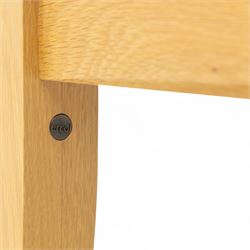 Ercol - light oak ‘Artisan’ coffee table, of rectangular form with chamfered top and gently tapered legs