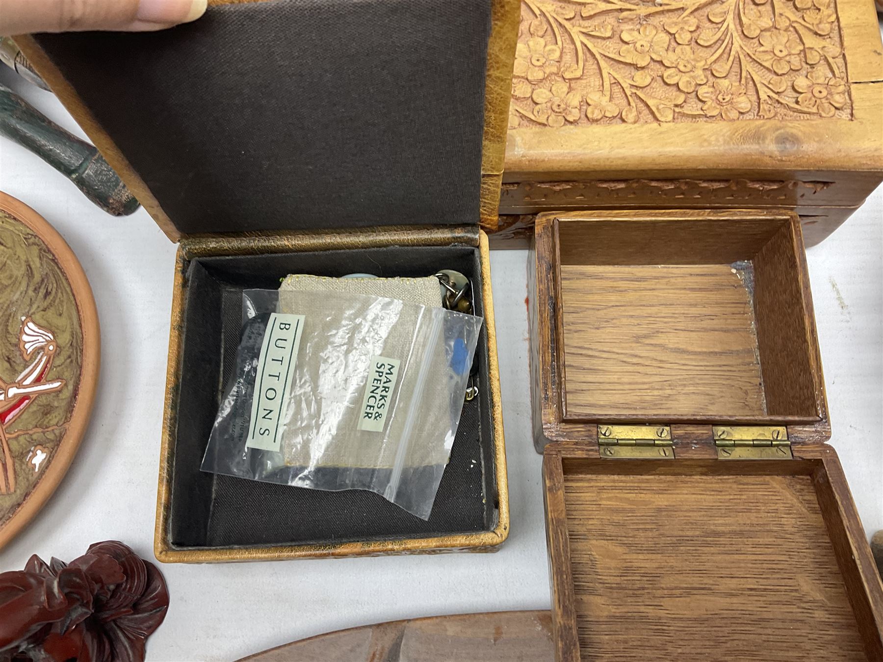 Two Greek Kerameikos plates together with a Kepamik plate and other Grecian style ceramics, carved African figures and treen, boxes etc 