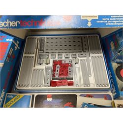 Fischer Technik/Lego/Playmobil - thirteen model building sets comprising eight Fischer Technik sets 50, 50/1, 50v, 50/2, 50+mot1 and two 50S, 50/1 add-on pack, with spare parts packs 01, 03, 05, two 22 and 30; two Lego sets comprising C107 and Lego Systems 103, part-set 870 and 970; Playmobil no.3520 set; four boxes of loose lego, various instruction manuals and a scrapbook 