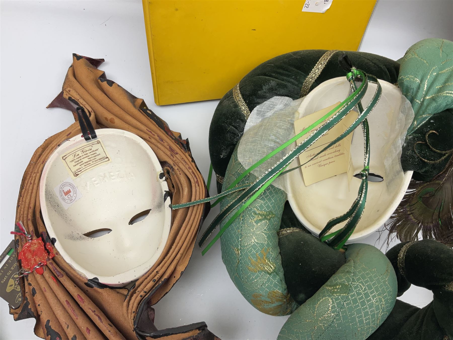 Kennedy 1964 silver half dollar, together with other American coins, bronzed figure of a young boy water carrier with yoke and brass pails, Green man wall mounted head, carved wood fish and Venetian masks etc