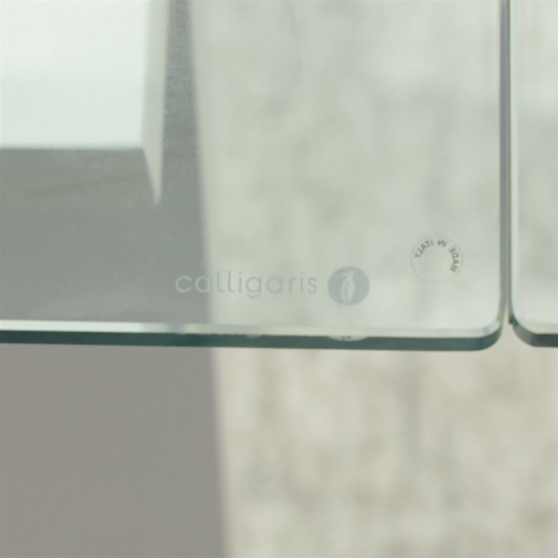 Calligaris - Connubia dining suite, comprising a 'Zeffiro' glass extending dining table and eight 'Academy' chairs, rectangular clear glass top with twin extension leaves extending to 220cm, mounted on white and ochre metal supports with central stretcher, together with eight matching moulded dining chairs with shaped seats and tapered legs