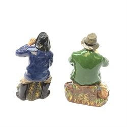 Two Royal Doulton figurines, A Good Catch HN1965, and Sea Harvest HN2357, each with green printed mark beneath. 