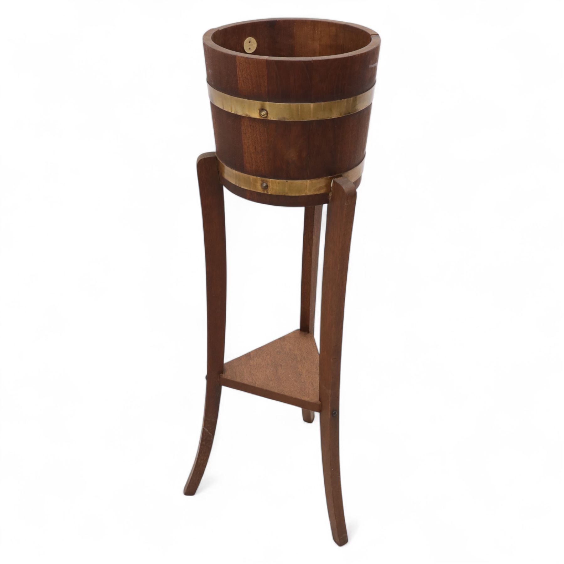 Mahogany torchiere H103cm, pine hat makers' stand H102cm, H91cm brass-bound planter on stand, brass standard lamp stand H127cm (4)