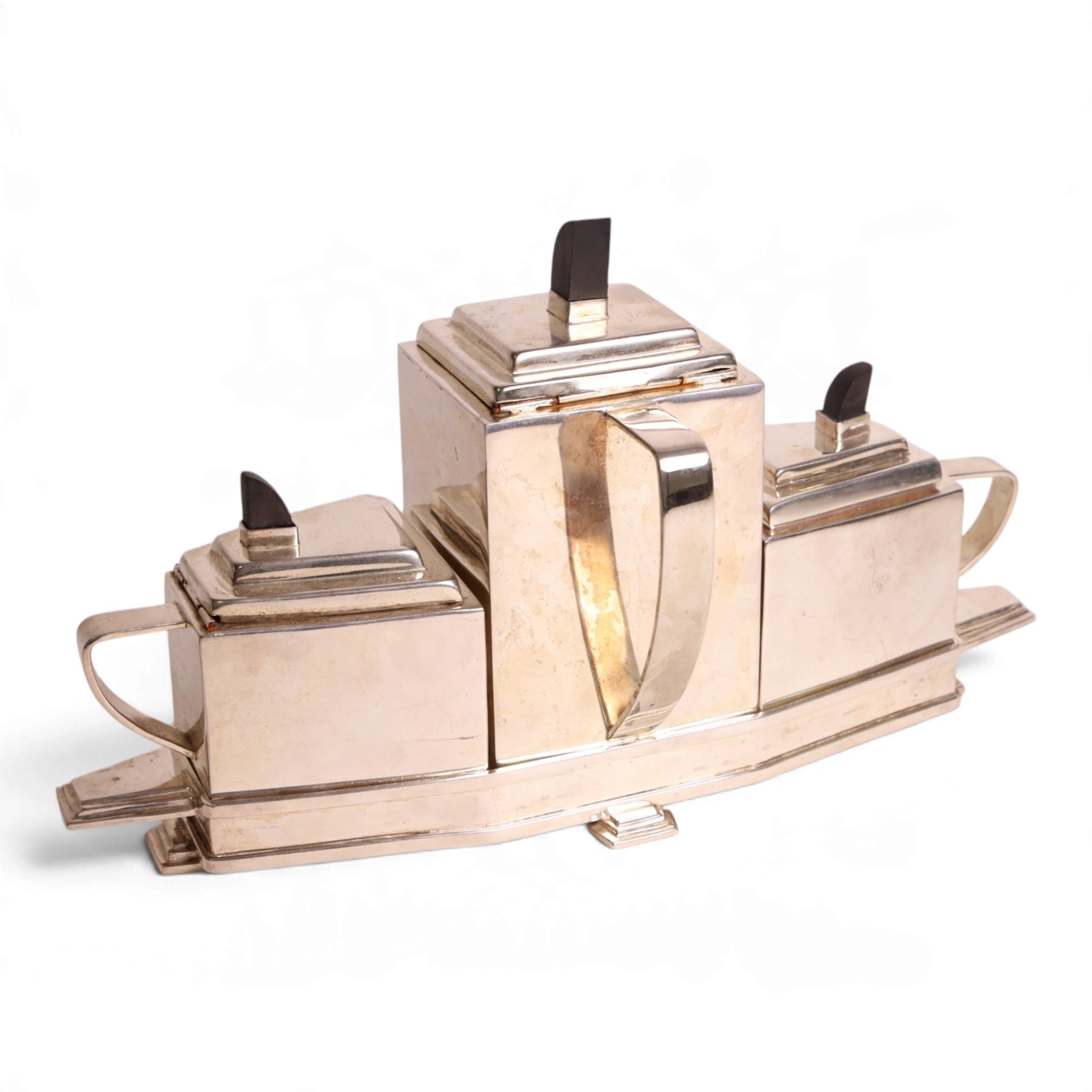 Art Deco silver plated tea set, in the manner of Christopher Dresser, within a fitted tray H23cm