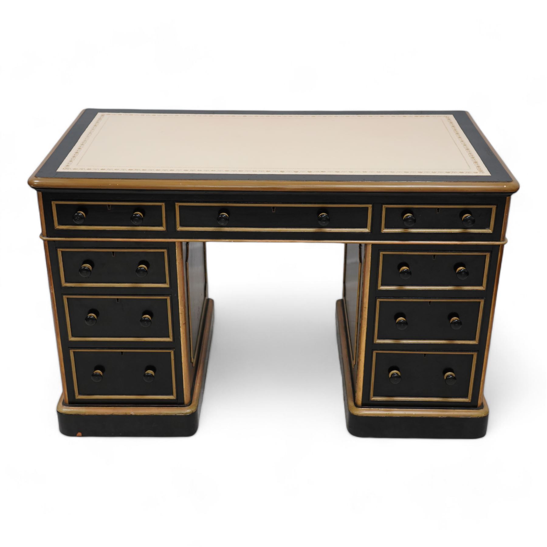 J. Maple & Co. (London: 1841-1988) - Victorian black painted and parcel gilt twin pedestal desk, moulded rectangular top with rounded corners and cream leather writing surface, fitted with nine drawers, on moulded plinth base, stamped 'J. Maple & Son' 