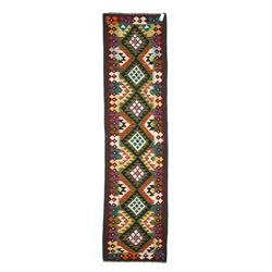 Chobi flatweave kilim runner, repeating diamond medallion design in a vibrant palette of g...