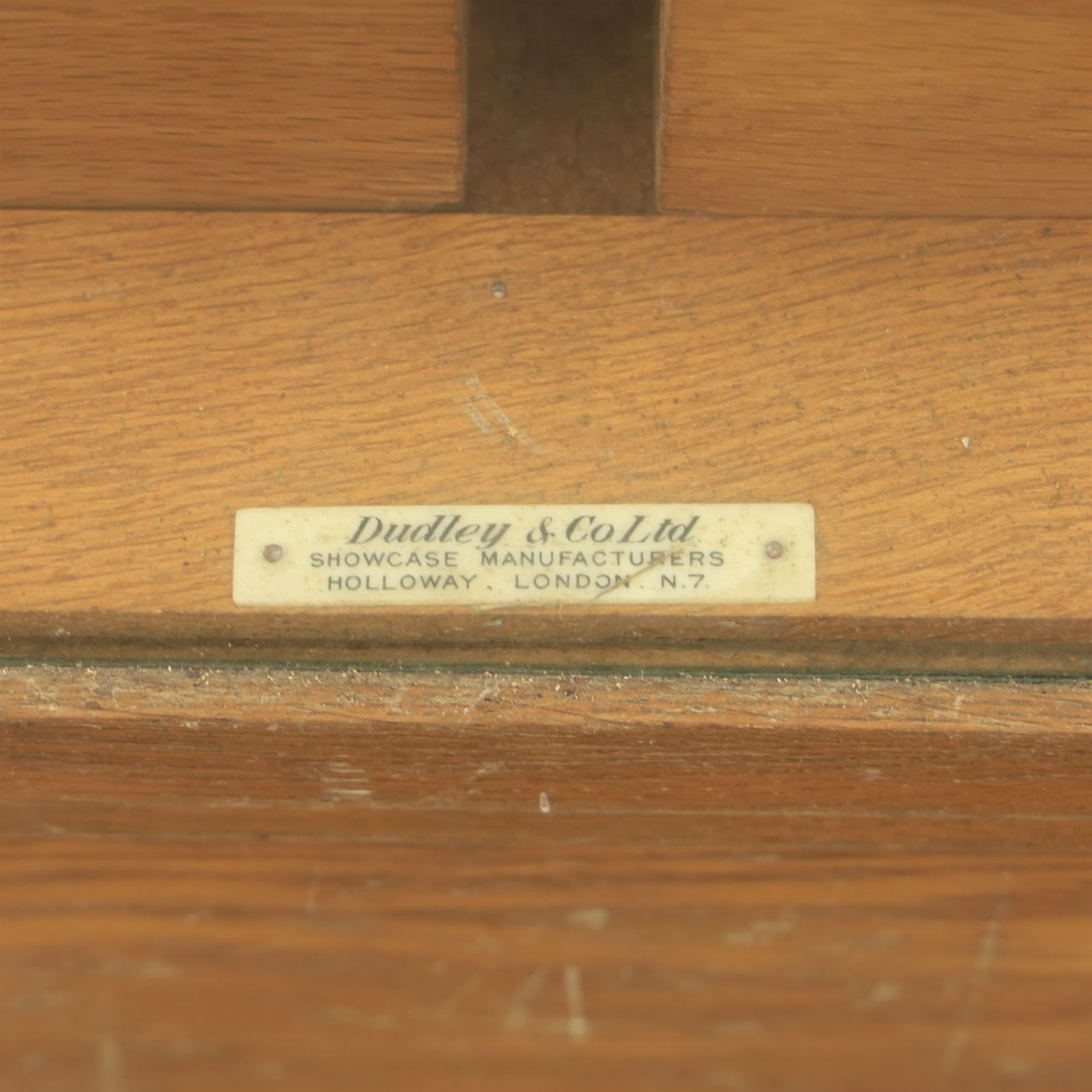 Dudley & Co - early 20th century oak framed and glazed haberdashery shop counter, fitted with sliding tray drawers