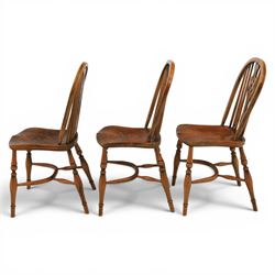Set of six elm Windsor chairs, saddle seats with crinoline stretchers