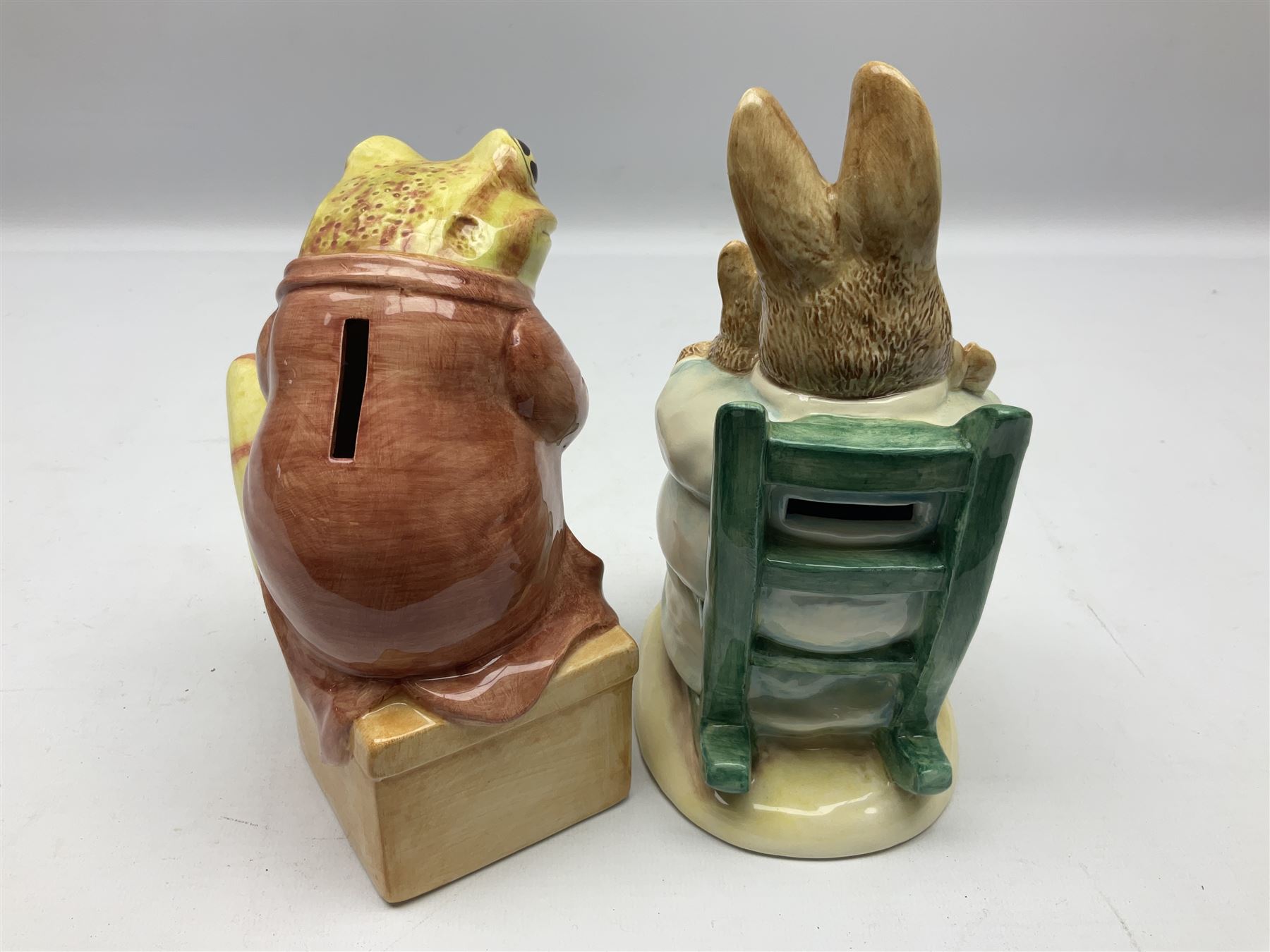 Nine Border Fine Arts and Enesco Beatrix Potter money boxes, to include Peter Rabbit, Benjamin Bunny, Mrs Tiggy-winkle, jemima puddle duck etc  