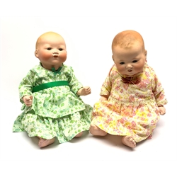 Two Armand Marseille Germany bisque head baby dolls, each with moulded hair, sleeping eyes, open mouth with teeth and composition body with jointed limbs, marked AM Germany 351./4K, H39cm (2)