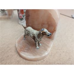 Pair of Art Deco dog bookends and a twin handled loving cup, painted with floral decoration and quote, loving cup H14cm