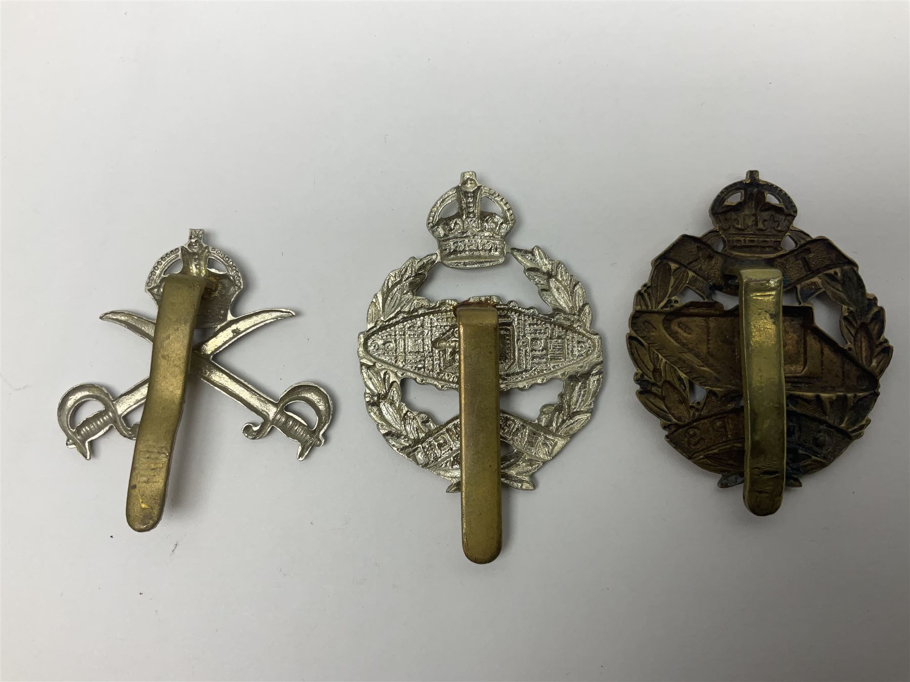 Twenty-seven military metal cap badges including Royal tank Corps, Reconnaissance Corps, Royal Armoured Corps, Royal Corps of Signals, Womens Army Auxiliary Corps, Queen Mary's Army Auxiliary Corps, Auxiliary Territorial Service,  Royal Engineers, REME, Army physical Training Corps etc 