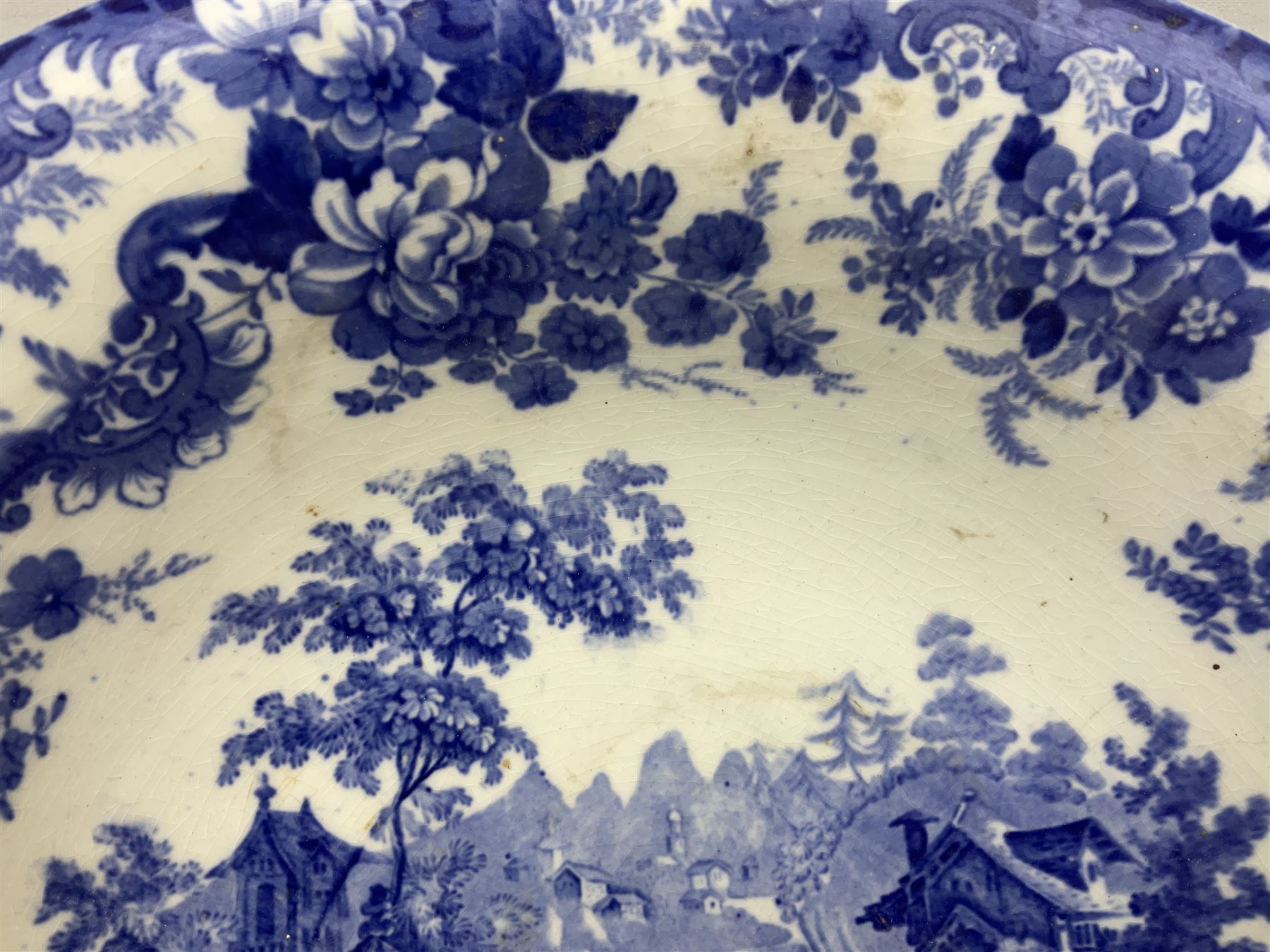 Mintons Genevese pattern wash bowl, jug and toothbrush holder, together with a similar Mintons blue and white soap dish, all decorated in the oriental style, all with printed marks beneath, largest D32cm