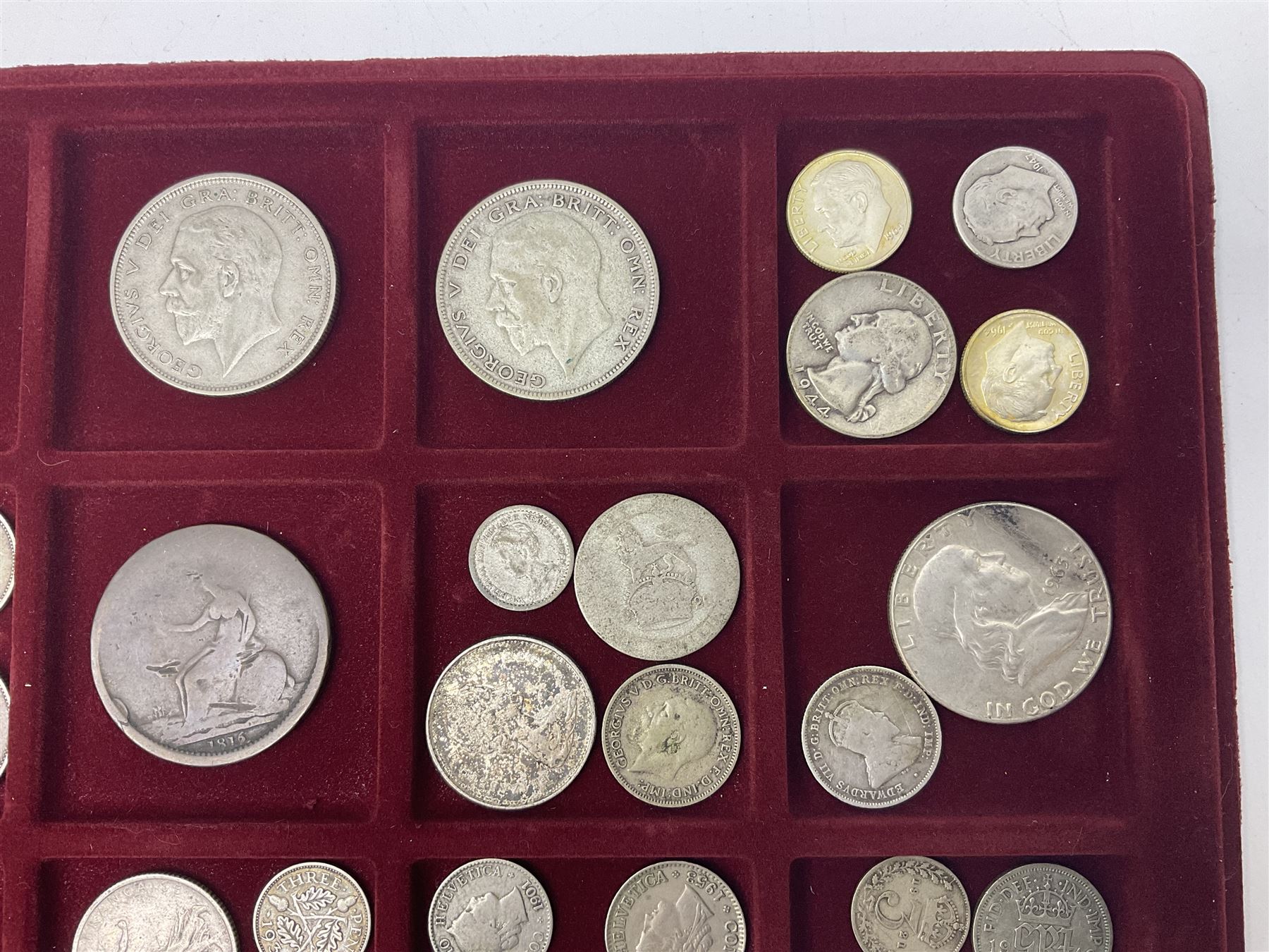 Great British and World coins including King George V 1935 crown, various silver three pence pieces, United States of America 1944 quarter dollar etc, housed in a coin tray