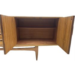 G-Plan – teak sideboard, four central drawers flanked by two double cupboards, enclosed by panelled doors 
