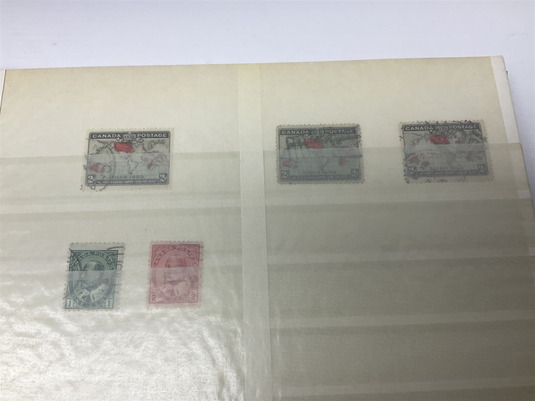 Great British and World stamps, including Queen Elizabeth II mint stamps in presentation packs, PHQ cards, Canada, Rhodesia and Nyasaland etc, in stockbooks and loose