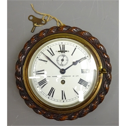  20th century oak case Bulkhead type Clock,, circular white enamel Roman dial with subsidiary seconds inscribed The Humber Shipwright Co.Ltd. Hull, in rope carved oak surround with brass bezel, single train movement, D21.5cm   