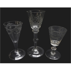  Georgian wine glass, bucket shaped bowl engraved with a bird and flower display on double knopped stem and folded domed foot, H15cm and two other Georgian wine glasses with engraved bowls (3)  