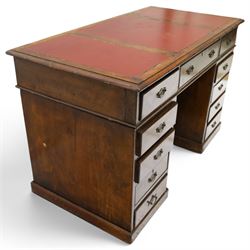 Late 19th century twin-pedestal desk, red leather inset top over an assortment of eleven drawers, on plinth base (W126cm D65cm H77cm); with Edwardian oak framed Captains swivel desk chair, of tub shaped form with spindle back supports (W60cm H89cm)