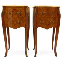 Pair of Louis XV style kingwood and marquetry bedside cabinets, the serpentine sienna marble top above two bombe fronted drawers with rococo style bronze handles and masks on slender cabriole legs terminating in bronze sabots  