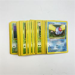 Collection of approximately five hundred vintage Pokemon TCG trading cards, mostly 1999 Wizards examples, including Jungle, Fossil, Team Rocket and Base Set, energy and trainer cards, together with Pokemon collectables including Zapdos 145 Collector Marble Case with eight marbles, Pokemon Gold Version Gameboy game, empty card boxes and Digimon cards
