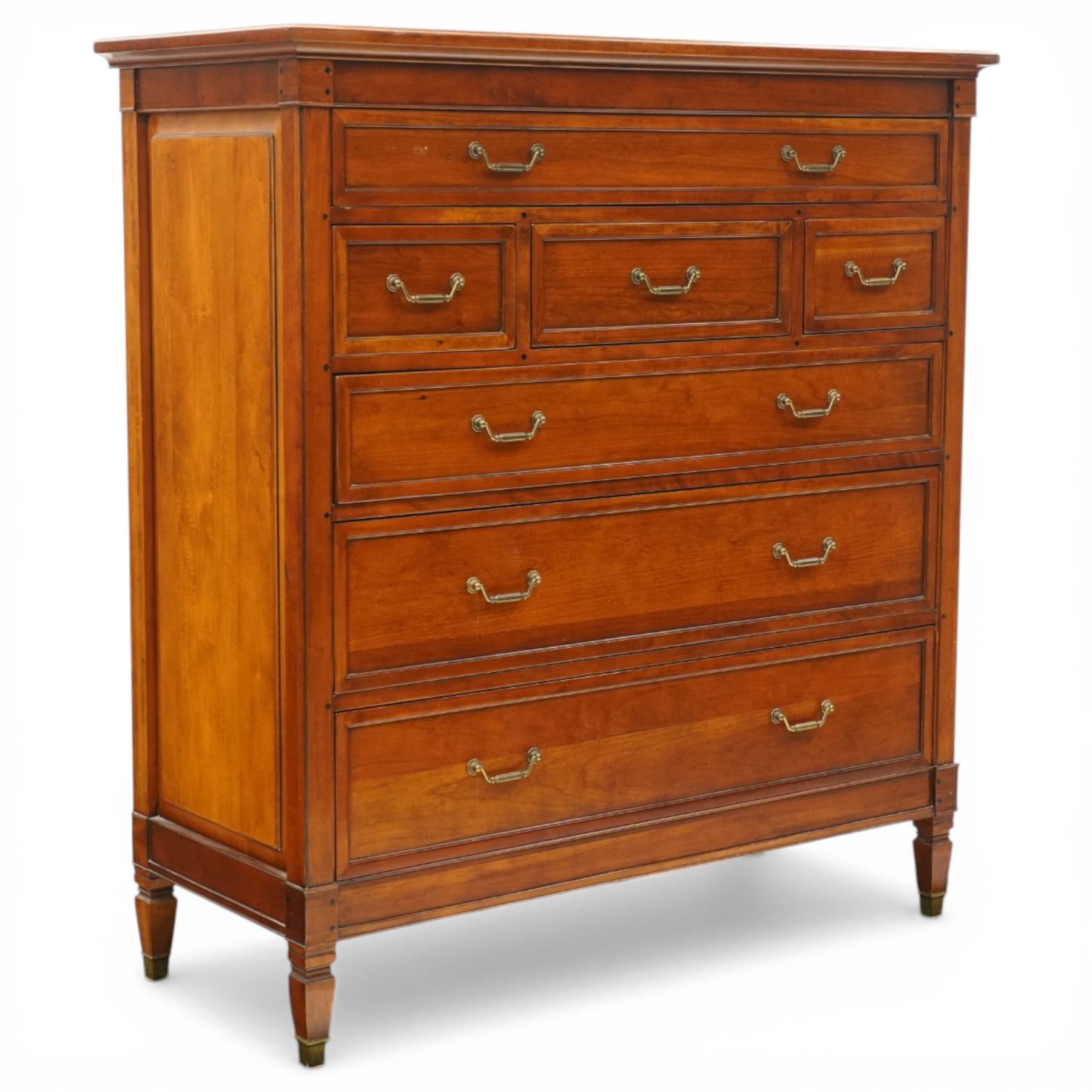 Willis & Gambier - 'Directoire' tall chest of drawers, rectangular top above an arrangement of seven drawers, raised on tapered and turned feet